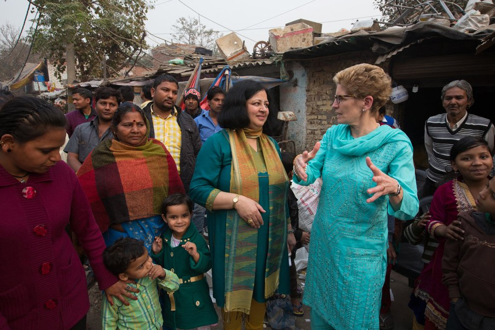 Ontario Premier Kathleen Wynne toured slums in Delhi as part of her 10-day trade mission to India.