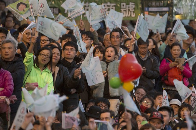 results at the party headquarters in Taipei, Taiwan, Saturday, Jan. 16, 2016.