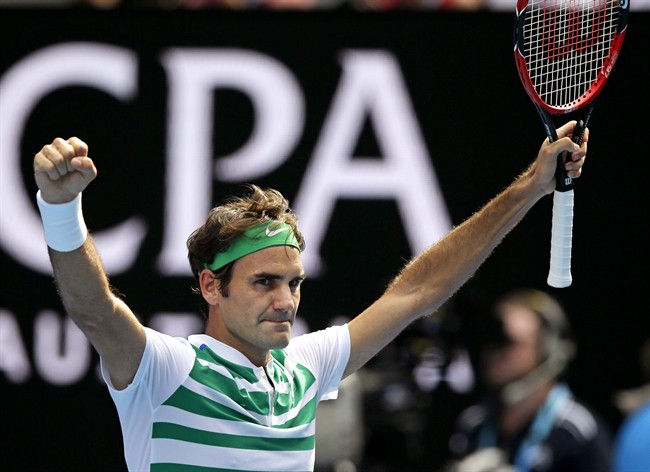 Roger Federer of Switzerland celebrates after defeating Tomas Berdych of the Czech Republic in their quarterfinal match at the Australian Open tennis championships in Melbourne, Australia, Tuesday, Jan. 26, 2016.().