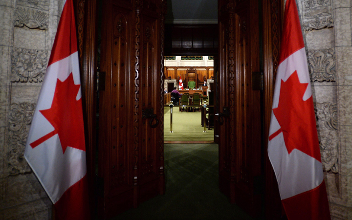 The doors of the House of Commons are closed as newly elected members of Parliament take part in an orientation session on Parliament Hill in Ottawa on Tuesday, Dec. 1, 2015. 