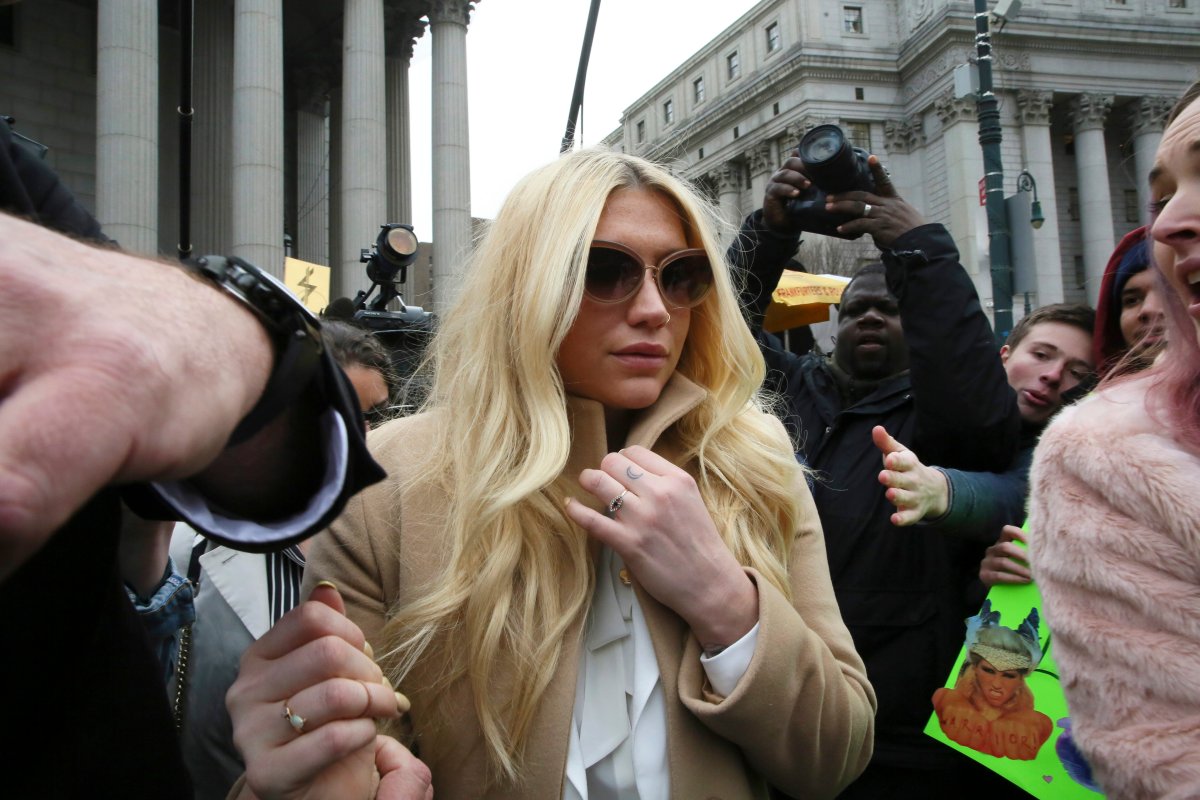 Pop star Kesha leaves Supreme court in New York, Friday, Feb. 19, 2016. Kesha is fighting to wrest her career away from a hitmaker she says drugged, sexually abused and psychologically tormented her - and still has exclusive rights to make records with her. 