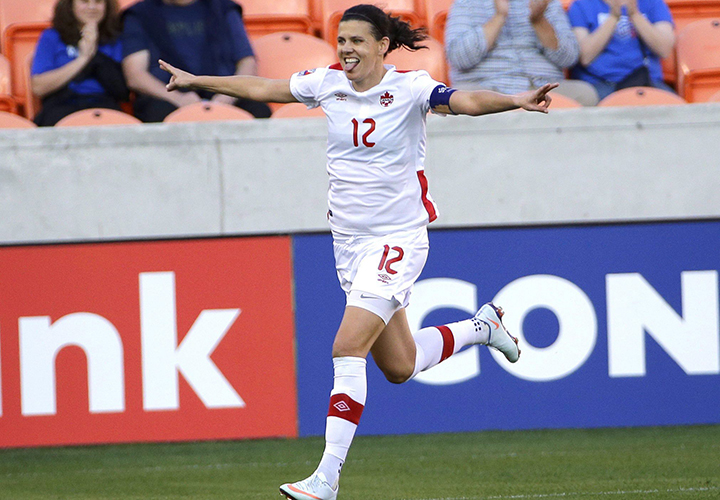 Canada's Christine Sinclair (12) celebrates after scoring a goal against Costa Rica during the first half of a CONCACAF Olympic women's soccer qualifying championship semifinal Friday, Feb. 19, 2016, in Houston.