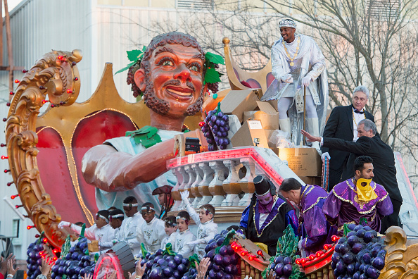 Actor and native New Orleanian Anthony Mackie tosses Mardi Gras beads to fans as he reigns as King of Bacchus  XLVIII in the 2016  Krewe Of Bacchus parade on February 7, 2016 in New Orleans, Louisiana. Mackie is the first African-American monarch for the krewe.  (Photo by Erika Goldring/Getty Images).