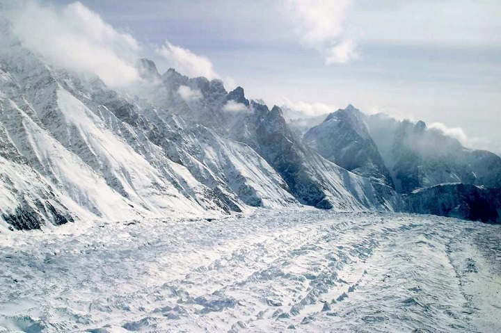 FILE -  This Feb. 1, 2005 file photo shows an aerial view of the Siachen Glacier, which traverses the Himalayan region dividing India and Pakistan, about 750 kilometers (469 miles) northwest of Jammu, India.  (AP Photo/Channi Anand, File).