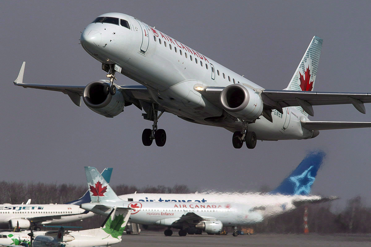 An Air Canada jet takes off from Halifax Stanfield International Airport in Enfield, N.S. on Thursday, March 8, 2012. Canada's largest airline says carriers should be allowed to share information about unruly passengers to help keep the skies safer. 
