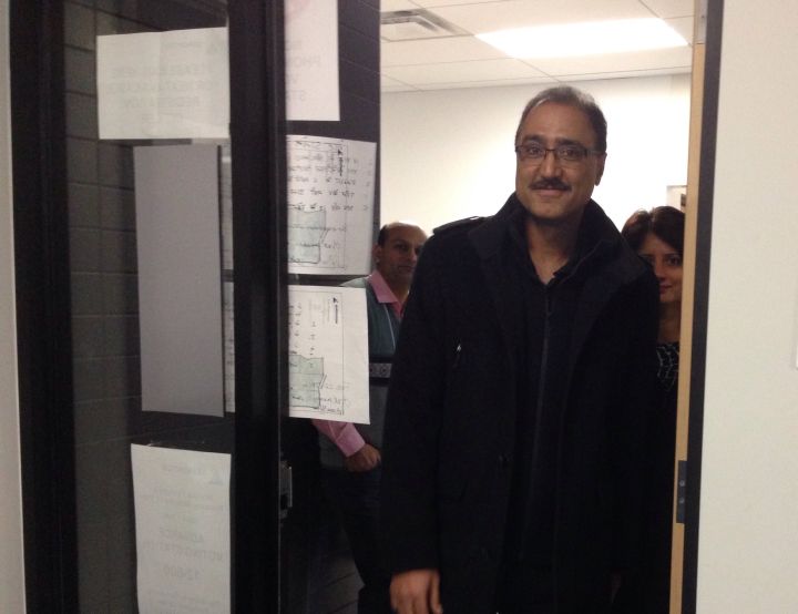 Federal Infrastructure Minister Amarjeet Sohi casts his ballot in the advance polls in Edmonton's Ward 12 byelection Monday, Feb. 8, 2016.