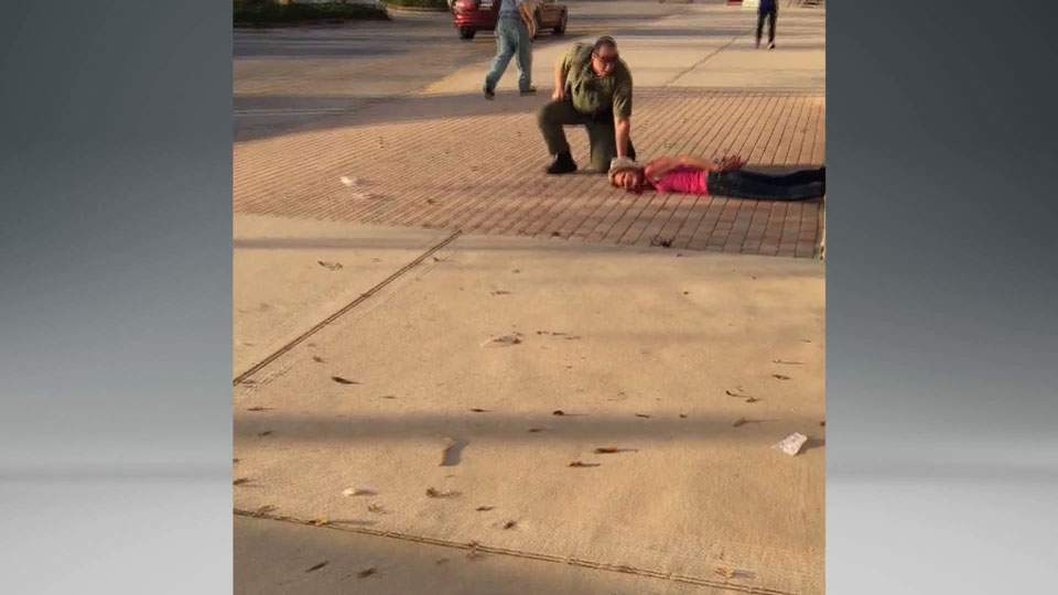 Caught on camera: police injures shoplifter during arrest, suspect claims excessive force unnecessary - image