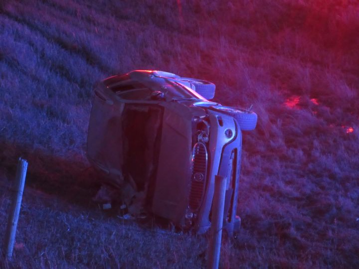 RCMP investigate a single-vehicle rollover west of Calgary on Feb. 24, 2016.
