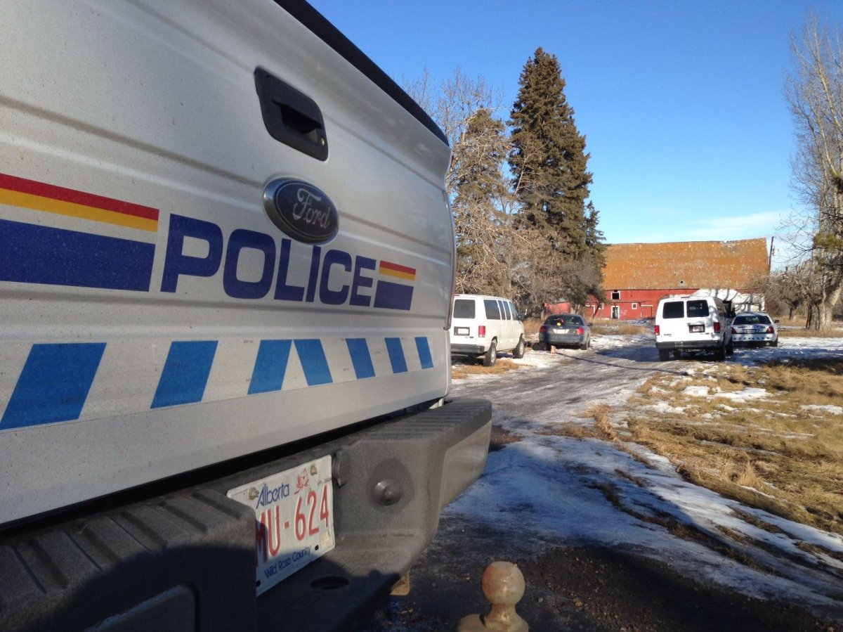 RCMP at a rural property near Beaumont, Alta. where a fire happened the day before. Tuesday, February 16, 2016.
