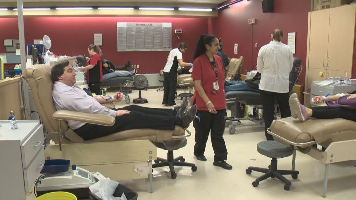 People donate blood in Edmonton Monday, Feb. 1, 2016.