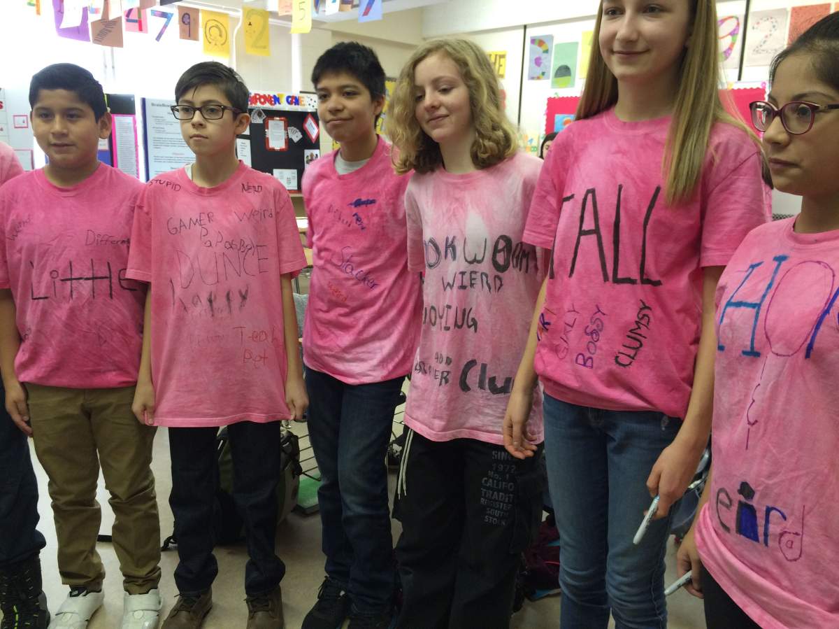Grade 7 students at St. Kevin show off their pink shirts on Feb. 22