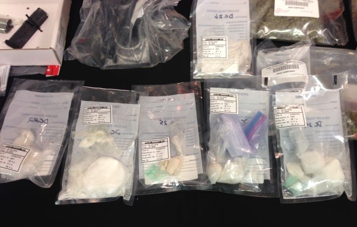 Calgary Police displayed drugs seized in from a
marijuana grow op and a butane extraction lab discovered at a home in the 2000 block of 28 Avenue S.W. on February 4 , 2016.