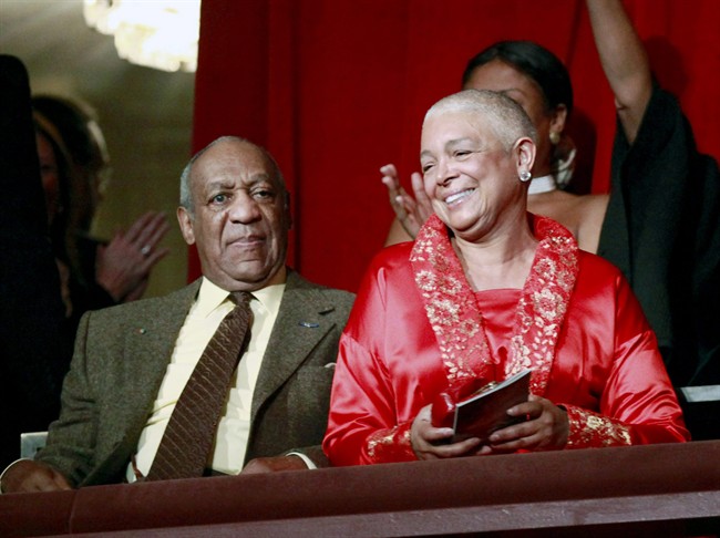 FILE - This Oct. 26, 2009 file photo, comedian Bill Cosby, left, and his wife Camille appear at the John F. Kennedy Center for Performing Arts before Bill Cosby received the Mark Twain Prize for American Humor in Washington.