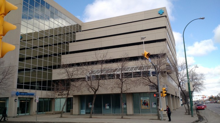 Employees were evacuated from a downtown Regina office building Tuesday after asbestos was found in a pipe construction crews cut through on Friday.