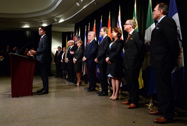 Prime Minister Justin Trudeau, left, talks after meeting with premiers at a First Ministers meeting at the Canadian Museum of Nature in Ottawa on Monday, Nov. 23, 2015.
