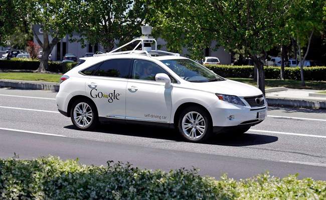 A Google self-driving Lexus is shown at a Google event outside the Computer History Museum in Mountain View, Calif., in this May 13, 2014 file photo. 