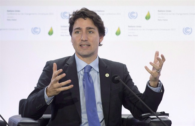 Canadian Prime Minister Justin Trudeau speaks during a session on carbon pricing at the United Nations climate change summit, Monday November 30, 2015 in Le Bourget, France.