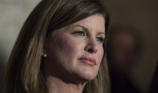 Interim Conservative leader Rona Ambrose speaks with the media following question period in Ottawa on December 8, 2015. 