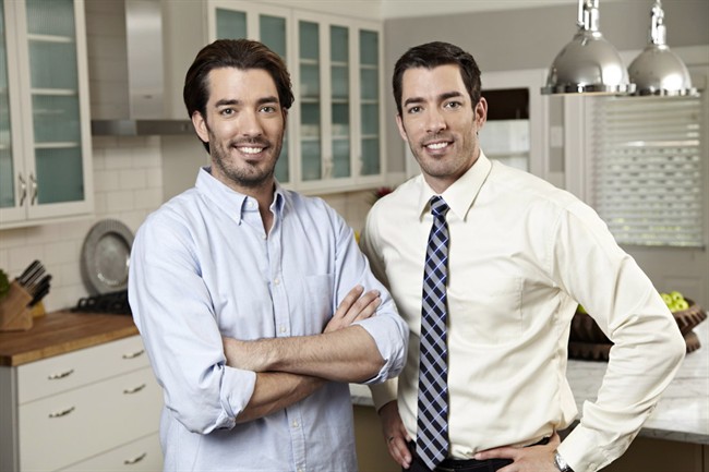 "Property Brothers‚" stars Jonathan (left) and Drew Scott are shown in an undated handout photo.They live in Las Vegas, but the "Property Brothers" stars still invest in real estate in their hometown of Vancouver where red-hot home sales and prices show few signs of cooling.