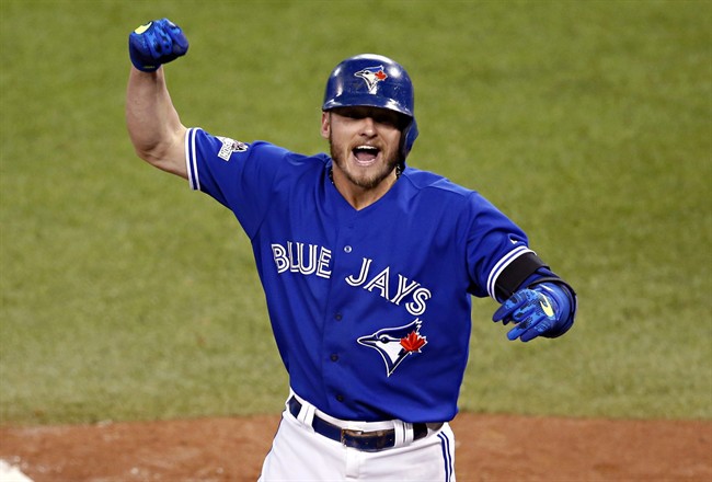 In this Oct. 19, 2015, file photo, Toronto Blue Jays' Josh Donaldson celebrates his two run home run against the Kansas City Royals during the third inning in Game 3 of baseball's American League Championship Series in Toronto.