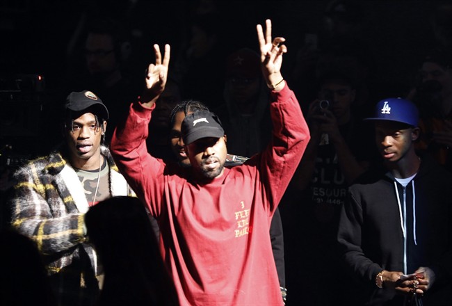 In this Feb. 11, 2016 file photo, Kanye West gestures to the audience at the unveiling of the Yeezy collection and album release for his latest album, "The Life of Pablo," at Madison Square Garden in New York.