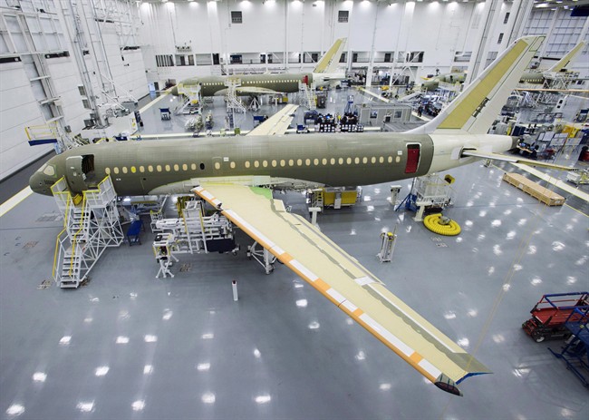 Bombardier's CS100 assembly line is seen at the company's plant Friday, December 18, 2015 in Mirabel, Que. Ottawa and Quebec would control Bombardier's CSeries if the federal government joins the province in contributing US$1 billion to the troubled jet program, Quebec's transport minister said. 