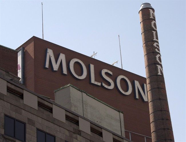 The Molson Coors brewery is seen Wednesday, June 3, 2015 in Montreal. Molson Coors Brewing Co. says a sluggish economy and higher food prices are affecting beer drinking in Canada's oil-rich provinces.