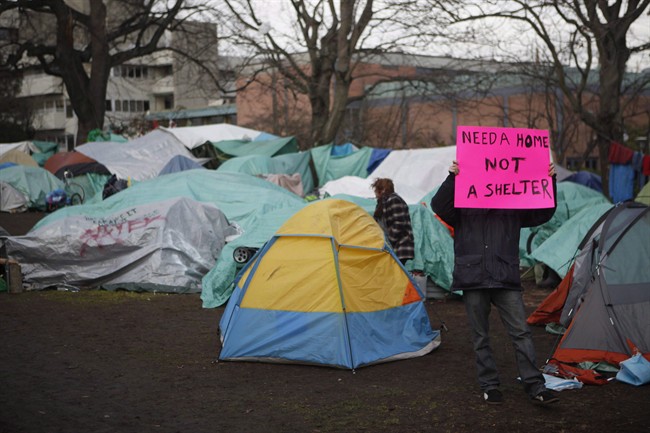 Residence of a homeless camp are shown in Victoria on Monday, January 11, 2016. 