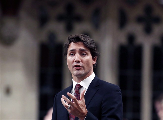 Prime Minister Justin Trudeau speaks in the House of Commons during during question period in Ottawa on January 27, 2016. An Ontario aboriginal community on an island in the southeastern portion of Georgian Bay is in danger of losing its only link to the outside world - an aging ferry the chief of the Beausoleil First Nation says is on the verge of sinking. Optimism is growing, however, among First Nations communities across Canada -- along with a competing list of demands -- now that Prime Minister Justin Trudeau has vowed to reform Canada's relationship with Aboriginal Peoples.