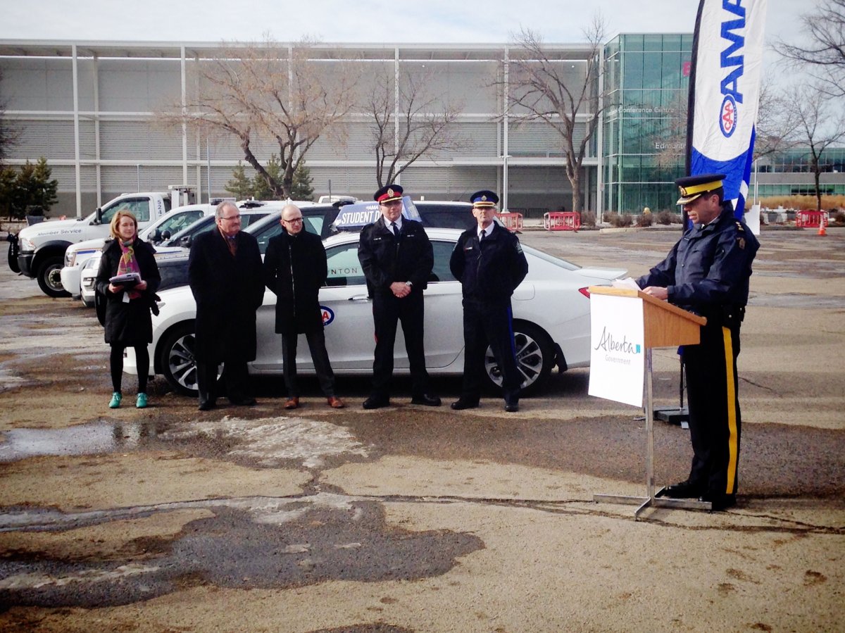 Police and government officials remind Albertans about the province's new distracted driving penalties.