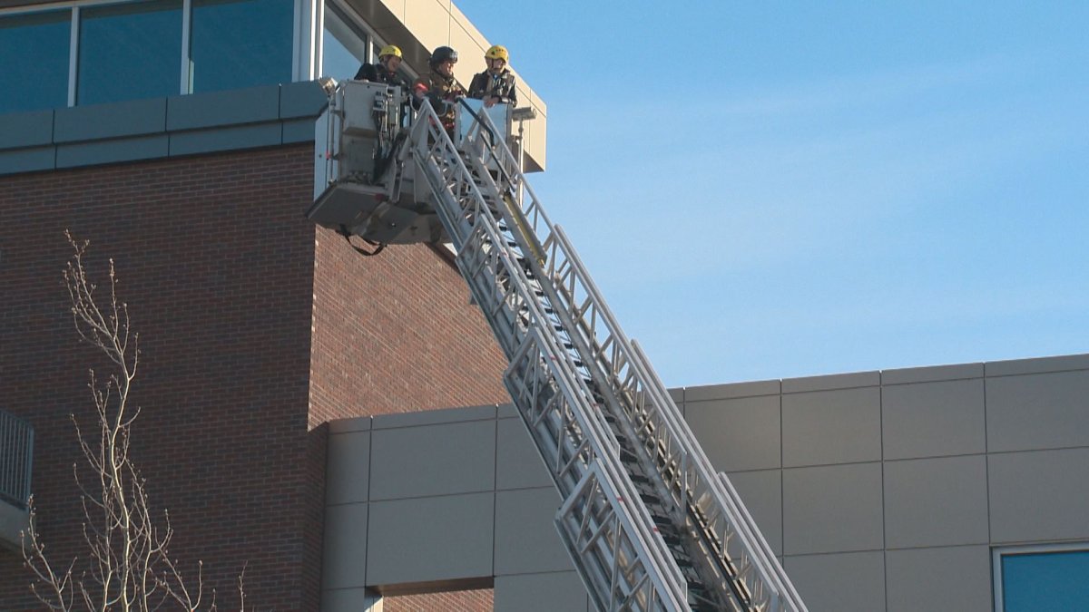 Firefighters in Strathcona County are raised to the roof for the annual muscular dystrophy campout.