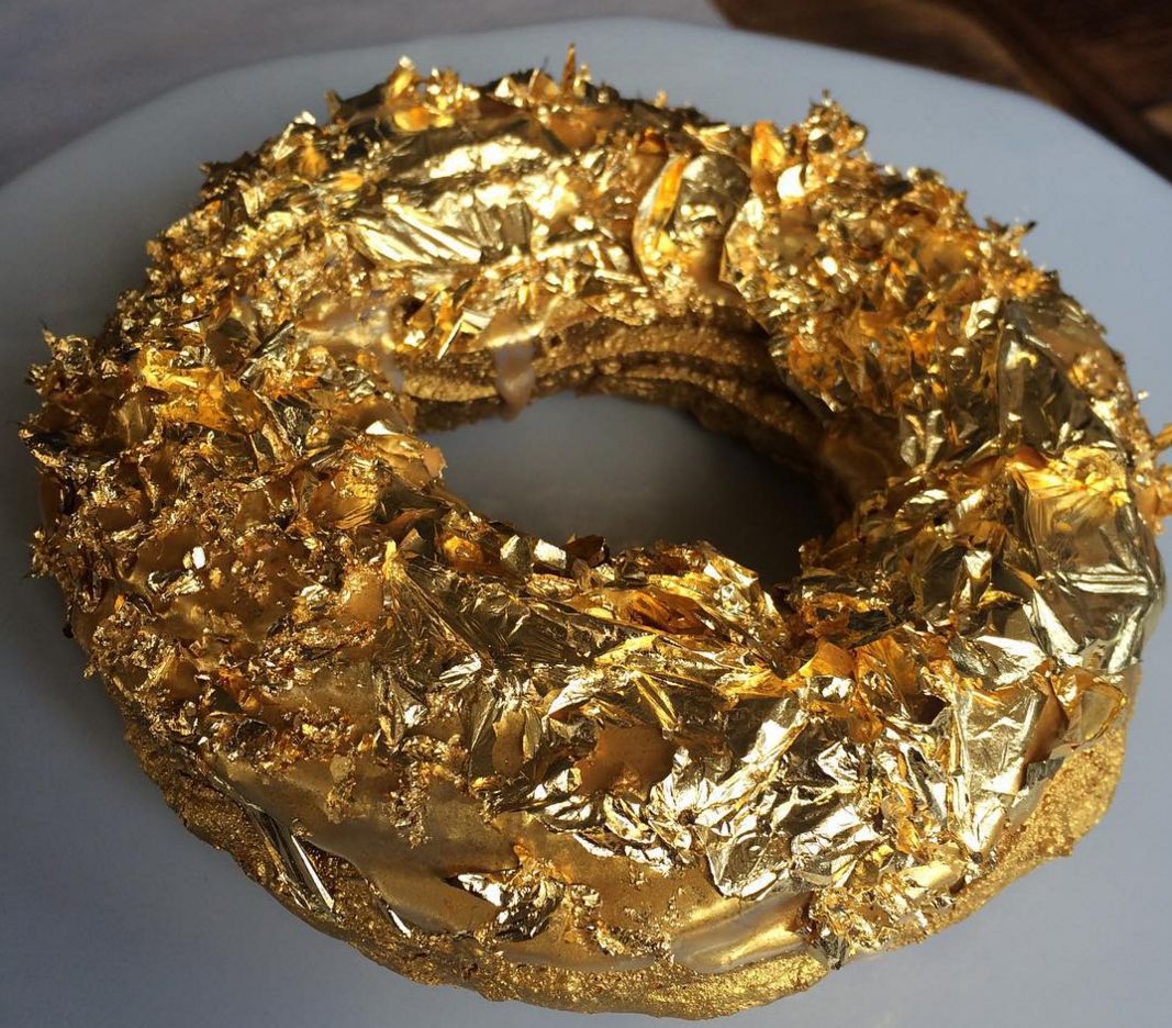 This luxury donut is slathered in Cristal and sprinkled with gold. It's being sold for $100 in Brooklyn. 