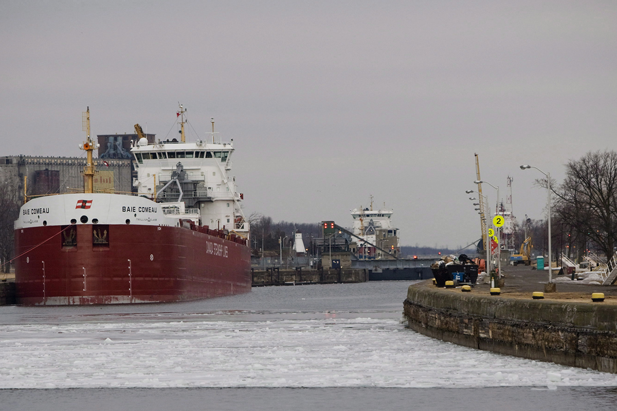 Ice floats past ships in the Welland Canal near Lock 8 in Port Colborne, Ont., Friday, March 28, 2014. The St. Lawrence Seaway Management Corporation marked the opening of the Seaway's navigation season Friday. 