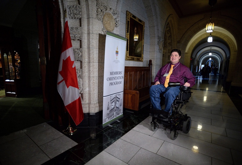 Liberal MP and cabinet minister Kent Hehr makes his way into the House of Commons on Parliament Hill in Ottawa on Tuesday, Dec. 1, 2015.