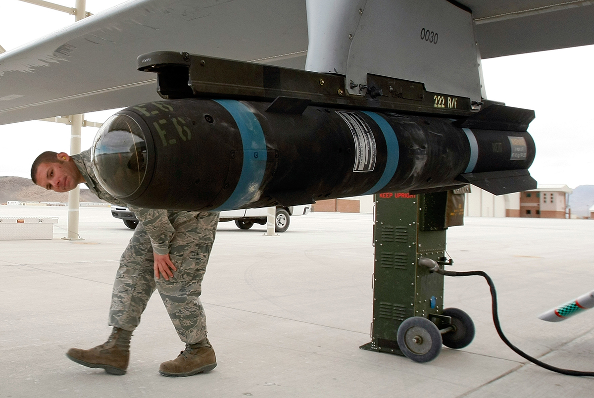 FILE: Airman 1st Class Ozzy Toma walks around an inert Hellfire missile as he perform a pre-flight check on an MQ-1B Predator unmanned aircraft system (UAS) April 16, 2009 at Creech Air Force Base in Indian Springs, Nevada.