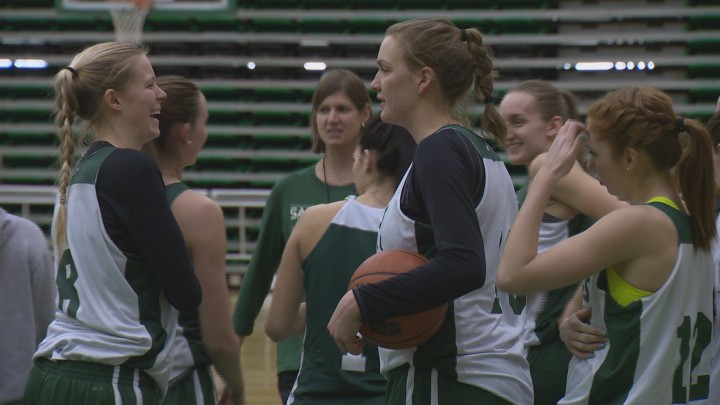 The University of Saskatchewan Huskies women's basketball team shares a laugh at a recent practice.