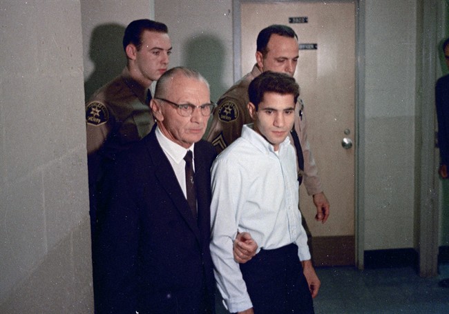 This June 1968 file photo shows Sirhan Sirhan, right, accused assassin of Sen. Robert F. Kennedy with his attorney Russell E. Parsons in Los Angeles. For nearly 50 years, Sirhan Sirhan has been consistent: He says he doesn't remember fatally shooting Sen. Kennedy in a crowded kitchen pantry of the Ambassador Hotel in Los Angeles.