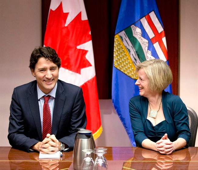 Prime Minister Justin Trudeau, left, and Alberta Premier Rachel Notley chat prior to a roundtable meeting with oil and gas producers in Calgary, Alberta, on Thursday, Feb. 4, 2016.