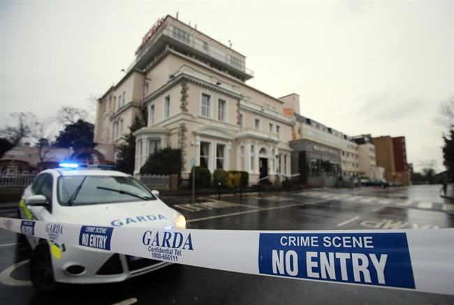 A police (Garda) cordon outside the Regency Hotel in Dublin, Ireland, after one man died and two others were injured following a shooting incident at the hotel, Feb. 5, 2016.