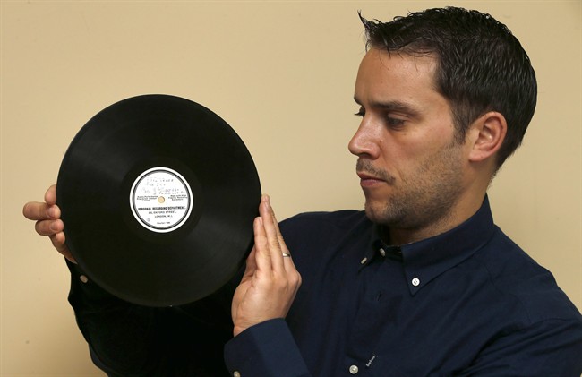 Paul Fairweather from Omega Auctions holds a 'Holy Grail' original recording by The Beatles that spent years in a loft, which will go on sale next month. A vinyl record cut by the Beatles before the Liverpool band hit stardom is going on auction. The 1962 recording was made in just one copy and features the songs "Till There Was You" and "Hello Little Girl".