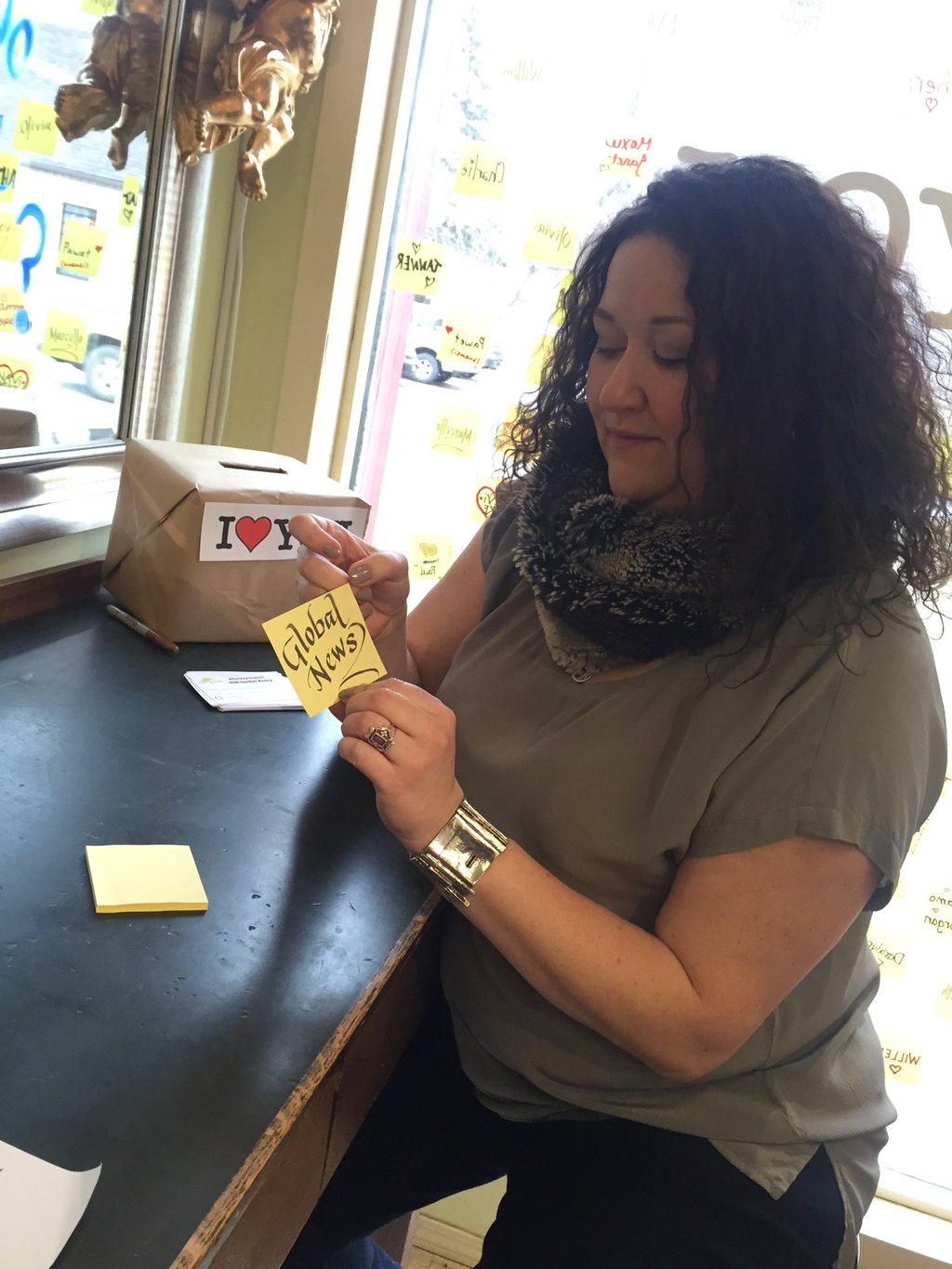 Store owner Theresa Kutarna wants to use the notes to show how fast love can spread.
