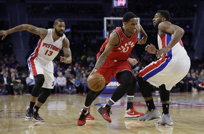 Toronto Raptors guard DeMar DeRozan (10) drives on Detroit Pistons center Andre Drummond, right, during the first half of an NBA basketball game, Monday, Feb. 8, 2016 in Auburn Hills, Mich. (AP Photo/Carlos Osorio).