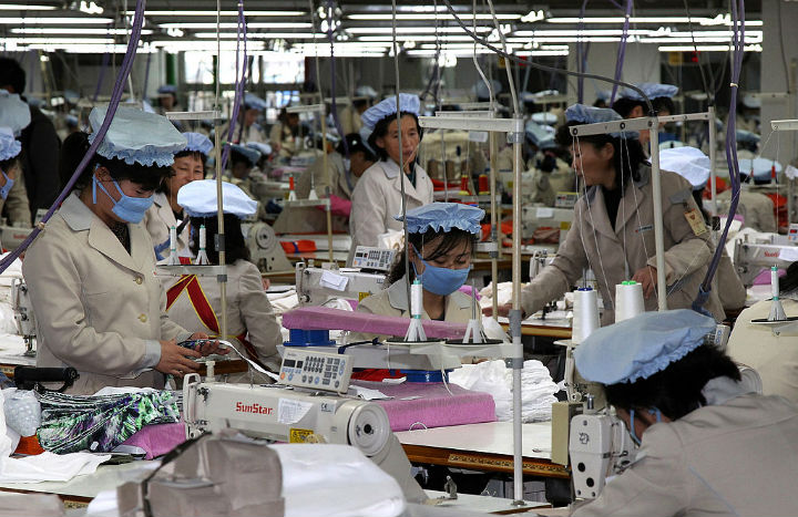 North Korean employees work at the assembly line of the factory of South Korean company at the Kaesong industrial complex on December 19, 2013 in Kaesong, North Korea.  (File photo).