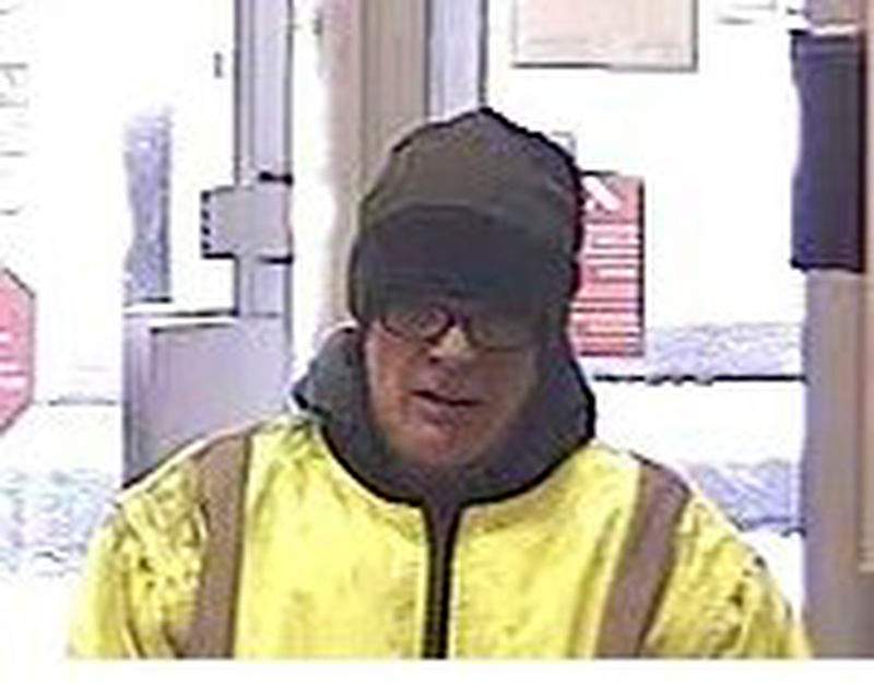 Security camera image of man involved in a bank robbery.