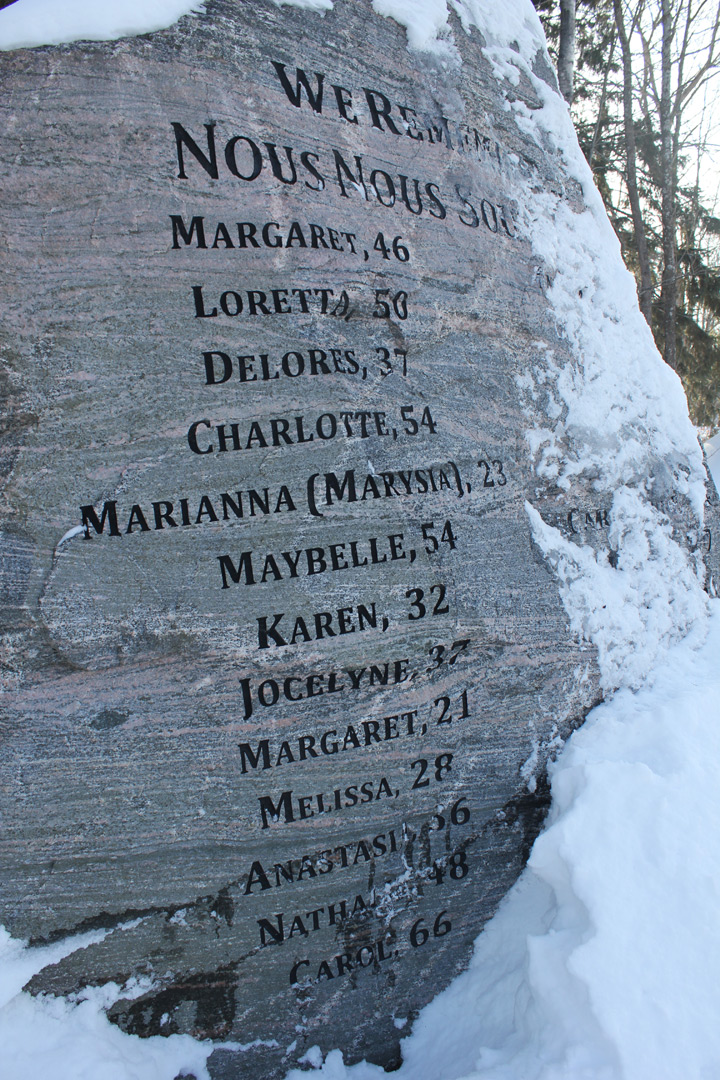 Names engraved on a snow-covered monument in Petawawa, Ontario. The memorial honours women killed by their partners in Renfrew County.