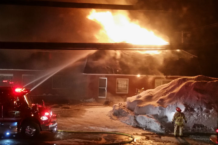 The fire broke out around 6:45 p.m. and the building was already engulfed by thick smoke and flames when firefighters arrived.