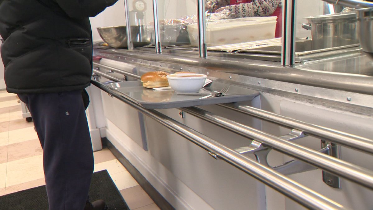 During a cold February day a client at the Romero House Soup Kitchen in Saint John receives a hot meal.
