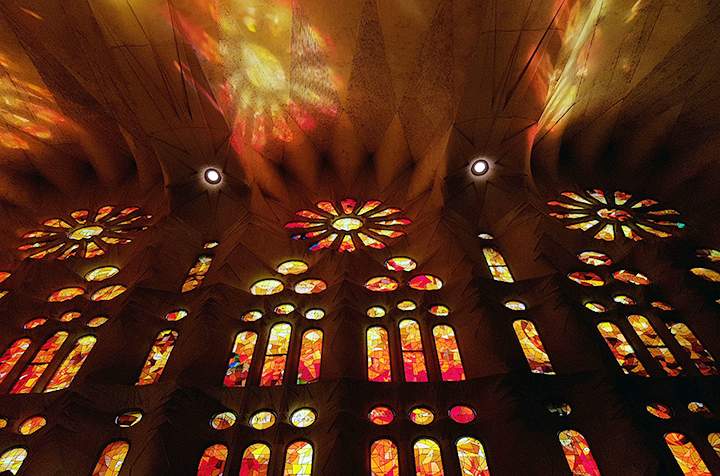 Samsung S7 edge captures challenging backlit stain glass windows reflecting on a dark ceiling at the Sagrada Familia in Barcelona