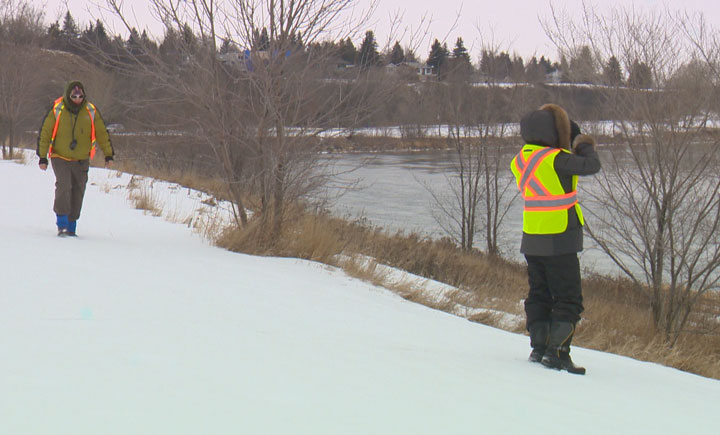 Searchers made their way along the Saskatoon riverbank Sunday trying to turn up any sign of Justin Kishayinew, 22, who has been missing since Feb. 10.