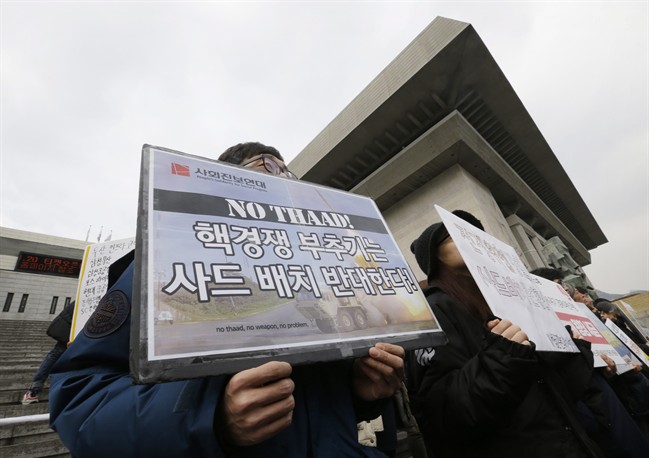 South Korean protesters shout slogans during a rally to oppose the possible deployment of the United States' advanced defense system THAAD, or Terminal High-Altitude Area Defense, on Korea Peninsula, in Seoul, South Korea, Thursday, Feb. 25, 2016.